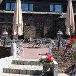 Außenfassade und Terrasse der Event-Location Langenhorst in Isselburg, Niederrhein.